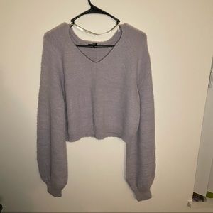 Rue21 sweaters in light pink, light blue and light purple.